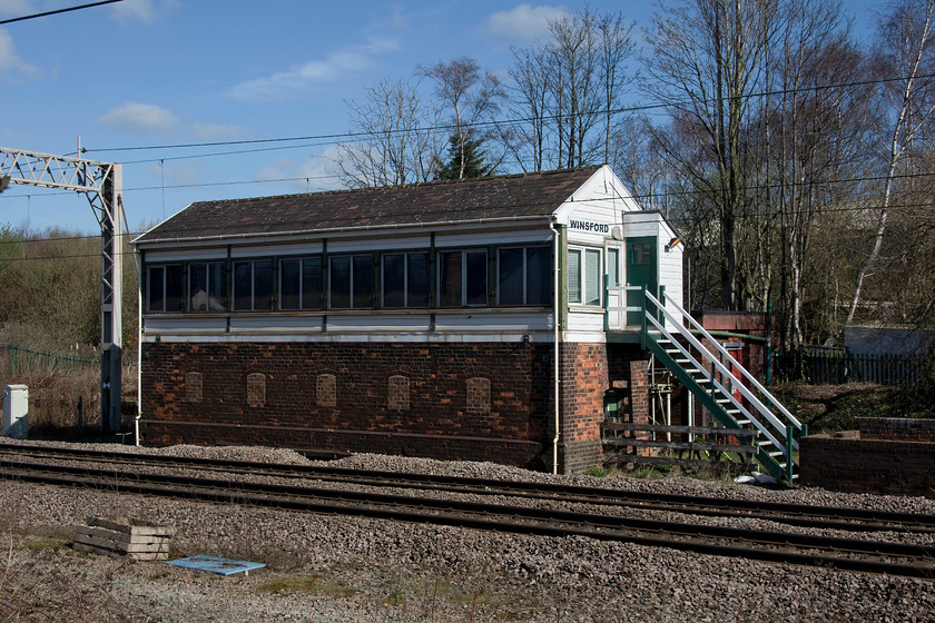 Winsford signal box (LNW, 1897) 
 This is a box that I have known about for some years but one that, for a number of reasons, I have never visited. Driving back from Warrington, I left the M6 at junction 19 and drove the short distance to Winsford. The box was a bit tricky to find down some winding roads in a housing estate but all this was worth it. The LNWR 1897 box survives in remarkable condition and, along with a number of other boxes, controls the section of line north of Crewe. This spot used to be at the junction of the Over branch line and the link line to the Chester line at Cuddington. According to the latest SRS information to hand, it contains levers 12 to 52 and a 1997 panel for the Hartford and Weaver Junction areas. After photographing the box, I continued my journey back to Northampton by re-joing the M6 at junction 18. 
 Keywords: Winsford signal box