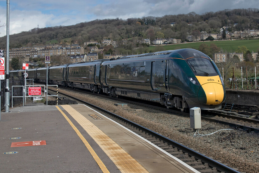 802104, GW 14.02 London Paddington-Bristol Temple Meads (1C17, RT), Bath Spa station 
 In a welcome burst of sunshine that did little to take the chill off the extremely cold north-easterly wind Great Western's 802104 drifts into Bath Spa with the 14.02 Paddington to Bristol express. Due to the truncated GWML electrification programme, this unit will have run with its pantograph raised until a few miles before Chippenham when it would be lowered and the diesel engines would have seamlessly taken over. 
 Keywords: 802104 14.02 London Paddington-Bristol Temple Meads 1C17 Bath Spa station Great Western Railway