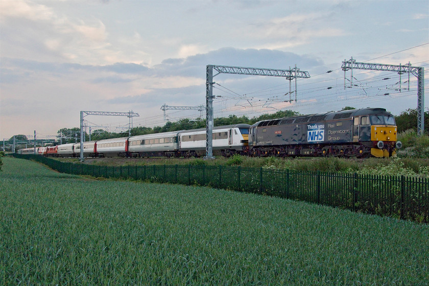 47813, 82136, 90035, 91128 & 57310, 19.26 Kettering-Bedford (3Q60, 24L), Irchester SP927667 
 The ROG/DATS MML overhead line inspection train makes its second run south during the evening as the 3Q60 19.26 Kettering to Bedford. The train is led again by 47813 'Jack Frost' with ex GA DVT 82136 tucked in behind followed by, further down the consist, 90035, 91128 'Intercity 50' and 57310 'Pride of Cumbria' at the rear. By now this test train was twenty minutes late here at Irchester and with the light so absolutely dire I decided not to wait for its final return run. The rest of the photographers at this spot made the same decision and we trudged back across the fields, past the allotments, to our parked cars. Let's hope for some better weather when this amazing train runs again! 
 Keywords: 47813 82136 90035 91128 57310 19.26 Kettering-Bedford 3Q60 Irchester SP927667 DRS Geater Anglia GA 125 Group ROG DATS MML Overhead Line Inspection Train Intercity 50 Pride of Cumbria Jack Frost Pretendolino LNER