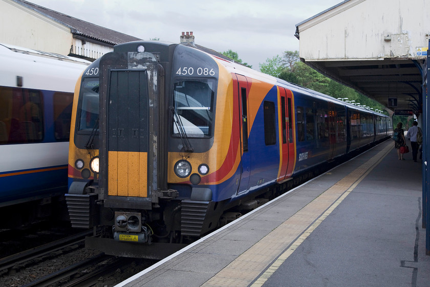 450086, SW 18.44 Winchester-Winchester Baltic Sidings ECS (5B94), Winchester station 
 Desiro 450086 leaves Wichester at walking pace making the very short trip from the station to the Baltic sidings for stabling. The move is less than a mile in distance but still has a timetabled departure time of 18.44 and a reporting number of 5B94! 
 Keywords: 450086 18.44 Winchester-Winchester Baltic Sidings ECS 5B94 Winchester station