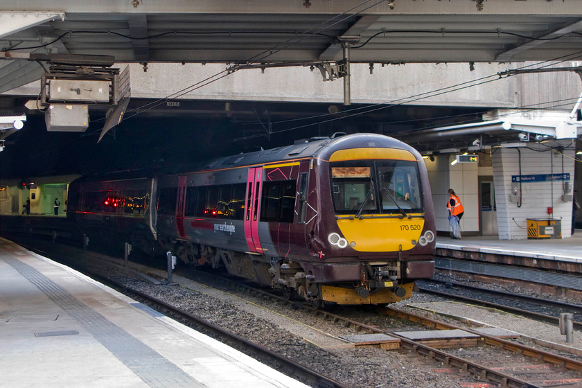 170520, stabled, Birmingham New Street station 
 The centre roads at New Street are often used for stabling purposes. Crosscountry's 170520 sits between duties 
 Keywords: 170520 Birmingham New Street station Crosscountry Trains XC Turbostar