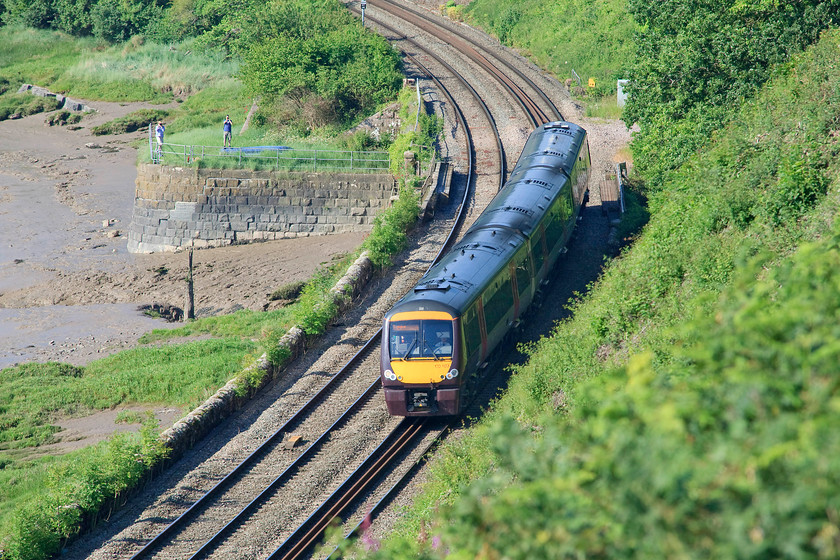 170103, XC 07.45 Cardiff Central-Nottingham (1M92, RT), Purton SO672049 
 170103 hugs the Severn Estuary near Purton in Gloucestershire working the 07.45 Cardiff Central to Nottingham. Whenever people think of the UK's coastal railways, the first to come to mind tends to be the South Devon line. However, this section of line in Gloucestershire, whilst not as long, is as dramatic in many respects. Notice the two enthusiasts who have gathered on the breakwater ready for the passing of the Deltic leading the The Welsh Central Liner railtour. 
 Keywords: 170103 1M92 Purton SO672049