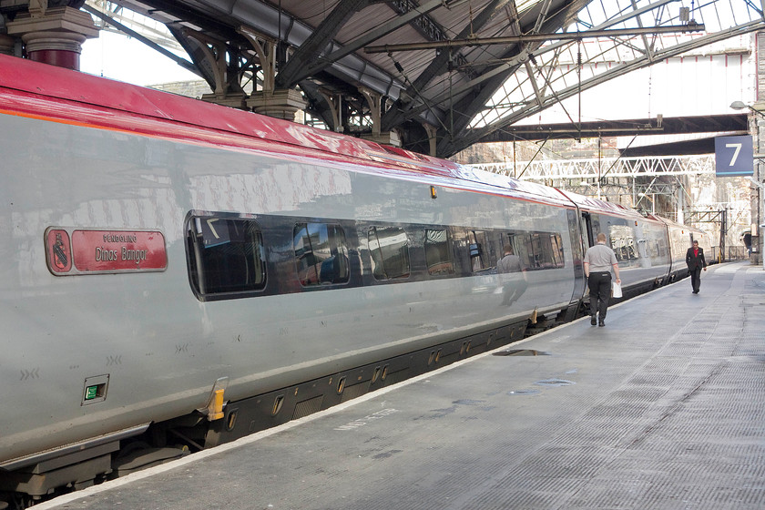 390042, VT 17.47 Liverpool Lime Street-London Euston (1A60), Liverpool Lime Street station 
 390042 'City of Bangor/Dinas Bangor' is being prpaerared to work the 17.47 to London Euston at Lime Street station. Its cast nameplate looks very smart on the side and is in the best traditions of nameplates unlike the vinyls increasingly being stuck to the sides of trains. I took this Virgin service as far as Stafford. 
 Keywords: 390042 17.47 Liverpool Lime Street-London Euston 1A60 Liverpool Lime Street station