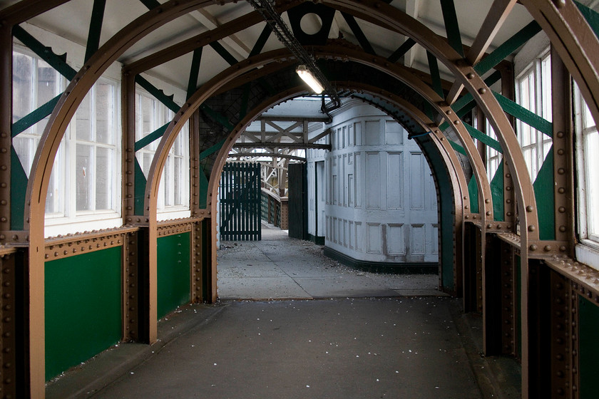 Former foot passenger entrance, Dover Marine station 
 Looking like it could be returned to use tomorrow, the former foot passenger entrance to Dover Marine station is seen through a securely locked gate. The large station was finally closed on 24.09.94 following a gradual run down of services that in itself followed the withdrawal of ferry services from the Western to the Eastern Docks. Whilst the station is often referred to as Dover Marine, it is also equally known as Dover Western Docks. 
 Keywords: Former foot passenger entrance Dover Marine station