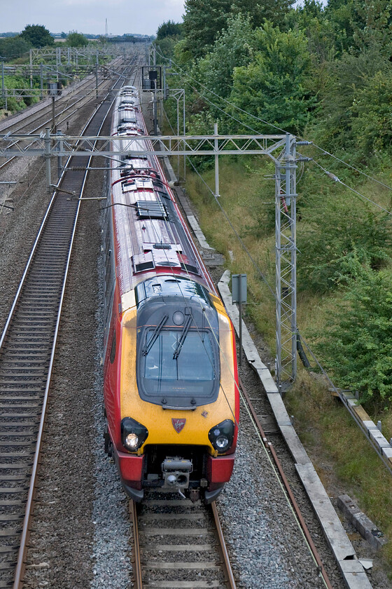 Class 221, VT 13.10 London Euston-Chester (1D87), Victoria bridge 
 A single Class 221 Voyager passes under Victoria bridge just south of the village of Roade working Virgin's 13.10 Euston to Chester 1D87 service. 
 Keywords: Class 221 13.10 London Euston-Chester 1D87 Victoria bridge Virgin West Coast Voayger