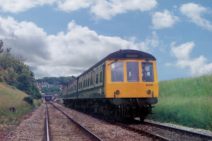 B581, unidentified Weymouth-Bristol Temple Meads working, Bradford-on-Avon foot crossing ST820605 
 With the town and the station in the distance, a Class 119 DMU, set B581, leaves Bradford-on-Avon with a cross-country working from Weymouth to Bristol Temple Meads. This view can be repeated today and remains very similar apart from the inevitable line-side growth, particularly to the right of the train. Also, I would not be so brazen and foolhardy now as to stand where I am to take this picture even though I am actually on a crossing!