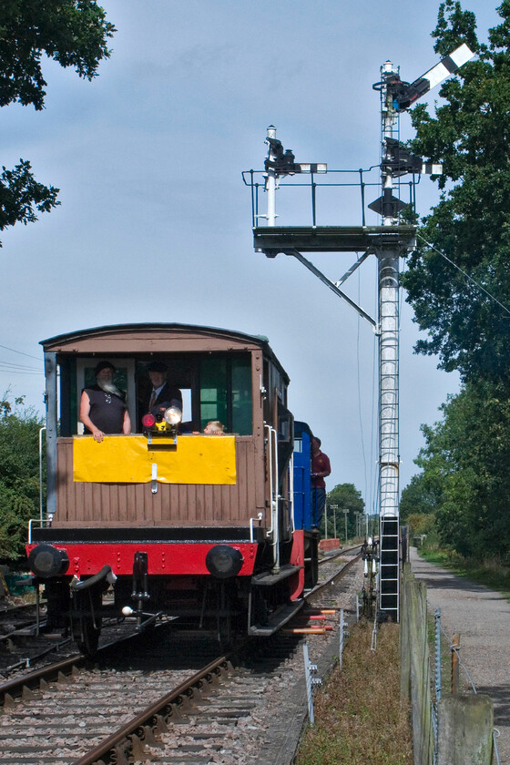 764, brake van ride, Pitsford sidings 
 With fare-paying passengers in the brake van resident Ruston & Hornsby shunter 764 'Sir Gyles Isham' propels the train back from Merry Tome Lane to Pitsford station. 
 Keywords: 764 brake van ride Pitsford sidings NLR Northampton and Lamport Railway Sir Gyles Isham 1953 Ruston & Hornsby shunter