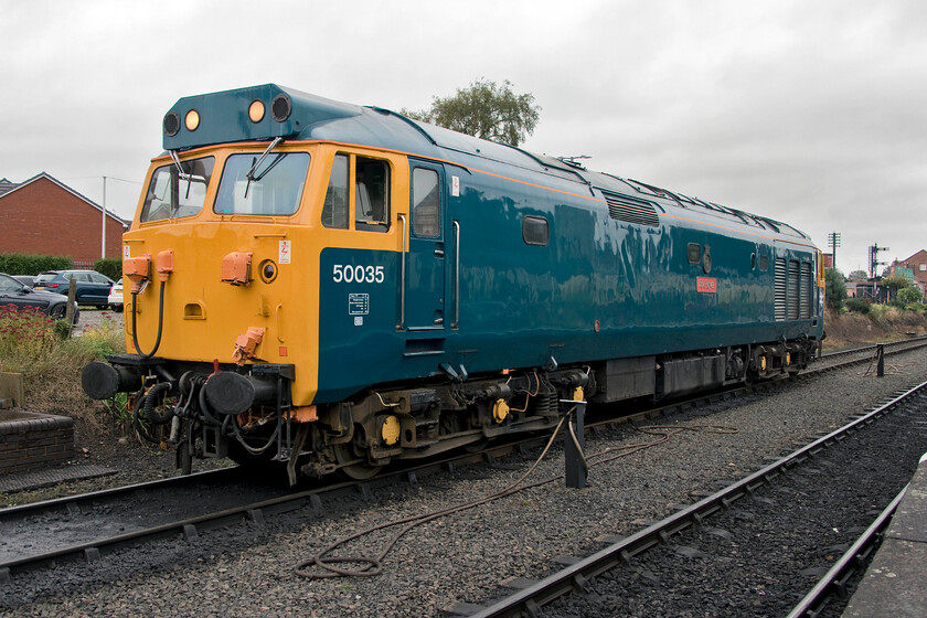 50035, stabled, Kiderminster SVR station 
 50035 'Ark Royal was the first member of the class to be preserved back in 1991 after being donated by NSE to The Fifty Fund during a ceremony at one of Old Oak Common's renowned open days. Since then it has been extensively overhauled a number of times and now works almost exclusively on its home railway at the SVR. Not registered for mainline operation it is a regular performer on the line. It stands at Kidderminster waiting to work its first train of the 2021 diesel gala, the 10.30 shuttle to Bewdley. 
 Keywords: 50035 Kiderminster SVR station Ark Royal