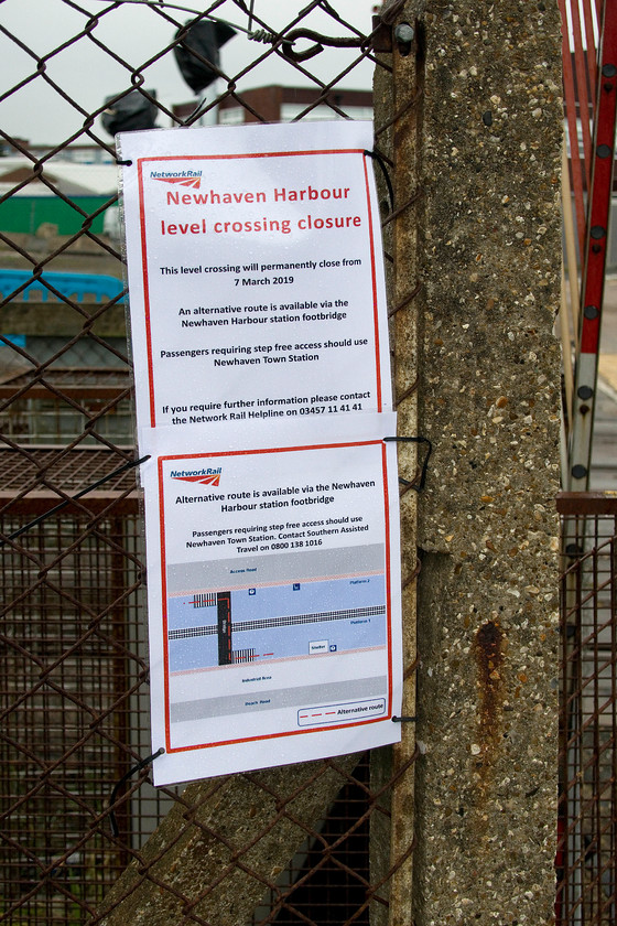 NR crossing closure notice, Newhaven Harbour level crossing 
 Network Rail's closure notice relating to the level crossing just south of Newhaven Harbour station. It's not surprising that the crossing is closing as the road really goes nowhere with alternative access easily available. We also subsequently found out that the narrow strip of land where the signal box is located will become part of the harbour's property with them moving their fence to the railway boundary thus totally negating any need for access. It's interesting to note that 'passengers requiring step free access should use Newhaven Town station', this is some distance away. In other words, it means that these passengers cannot use Harbour station, I don't think that this will go down well and is not an act of inclusiveness that I am sure that disability rights' groups should be taking up. 
 Keywords: NR crossing closure notice Newhaven Harbour level crossing