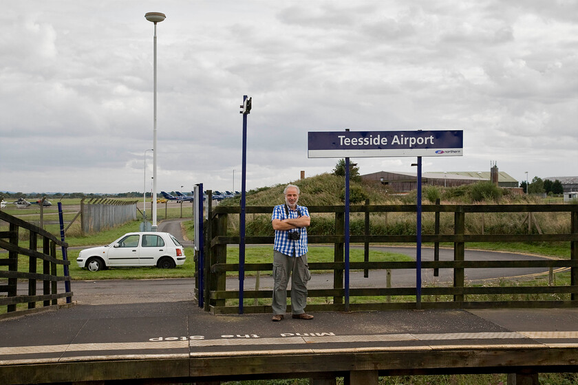 Andy & W282 WLE, Teeside Airport station (UK's least used station) 
 A station that Andy and I have been keen to visit for a number of years is Teeside Airport on the line between Darlington and Eaglescliffe. Its claim to fame is that last year it was mainland UKs least used station with just eight passengers. Indeed, it has been topping the least used station statistics for the last few years sharing this accolade along with such others as Shippea Hill and Dorking West. Andy is looking pleased that he has made the visit to this infamous station and that his Nissan Micra also features in the photograph! 
 Keywords: Andy W282 WLE Teeside Airport station UK's least used station Nissan Micra