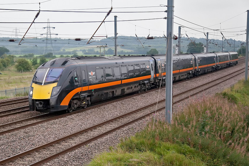 180107, GC 10.48 London Kings Cross-Bradford Interchange (1D71, 2L), Sandy TL176510 
 180108 'Hart of the North' was seen earlier in the day heading south. Here it is again passing New Zealand bridge north of sandy with the 10.48 King's Cross to Bradford Interchange 1D71 service. 
 Keywords: 180107 1D71 Sandy TL176510