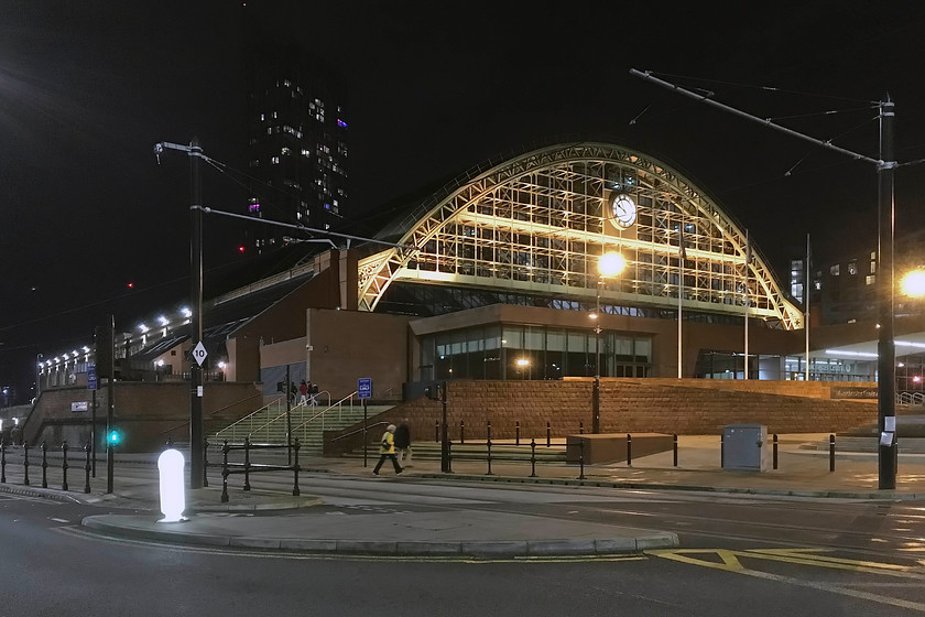 Former Manchester Central station 
 After an evening out at a superb concert held in Manchester's Bridgewater Hall, we emerged to find the former Manchester Central station illuminated and looking very impressive. The station was opened in 1880 by the Cheshire Lines Committee eventually being closed by BR in 1969 in a very sorry state. The grade II listed structure was rebuilt during the 1980s by Manchester City Council to be opened as the G-MEX centre, a venue for conferences and concerts. Following the opening of the Manchester Arena at Victoria station in 1995, it was extensively re-modelled to become, once again, Manchester Central, a large venue for hosting national events such as political conferences and, of all things the X-Factor final! 
 Keywords: Former Manchester Central station