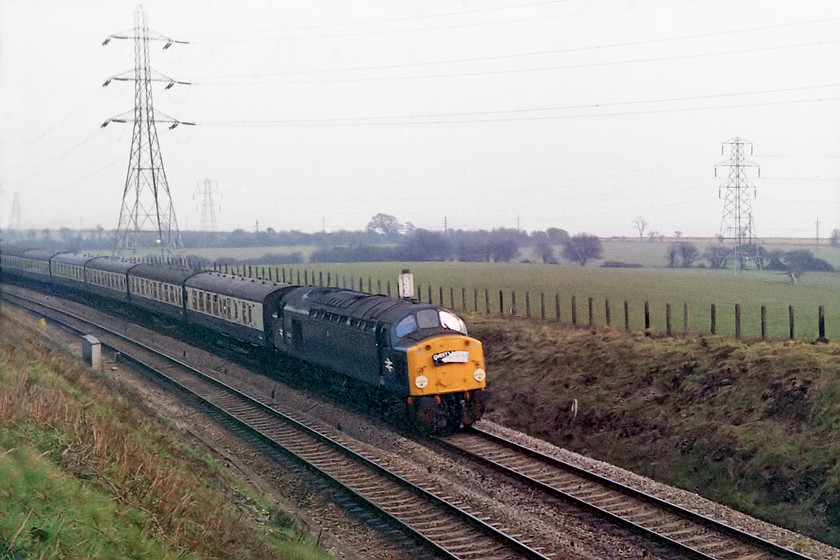 40120, outward leg of The Gwent Valley Invader, Crewe-Blaenavon (1Z46), Portskewett ST508883 
 After crossing over the Severn Bridge we made our way to Portskewett just east of Severn Tunnel Junction on the Chepstow line. We were just in time to see the outward leg of the Gwent Valley Invader railtour being lead by 40120 complete with a superb headboard. This railtour had started out from Crewe and was running as 1Z46 throughout. Once it arrived at Newport, the class 40 was then to lead the train up two of the valley lines up to Ebbw Vale and then to Blaenavon. 
 Keywords: 40120 The Gwent Valley Invader Crewe-Blaenavon 1Z46 Portskewett ST508883