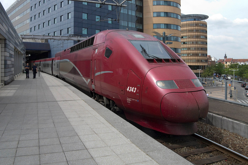 43 430, 11.59 Lille Europe-Amsterdam Central (THA 9993), Brussel Midi station 
 Thalys PBA number 4343 (43 430) stands in Brussels Midi station. My family and I boarded this train, the 11.59 from Lille Europe, and took it to Amsterdam Central where it terminated. These TGV styled units are very impressive if surprisingly short having only 10 coaches. 
 Keywords: 43 430 11.59 Lille Europe-Amsterdam Central THA 9993 Brussel Midi station