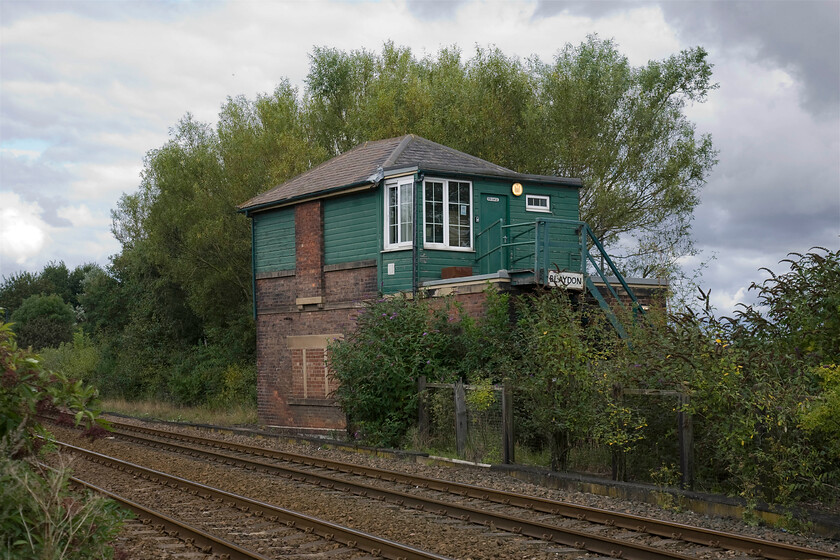 Blaydon signal box (NE, not known) 
 Another view of Blaydon signal box with the former freight route to Gateshead passing the old 'rear' of the box. These are now the only lines now in operation with the former front of the box facing the trees. I do not have a note of the date of construction of the NER Type N2 box but I suspect it to be around 1900 unless anybody can supply me with the information? 
 Keywords: Blaydon signal box North Eastern Railway