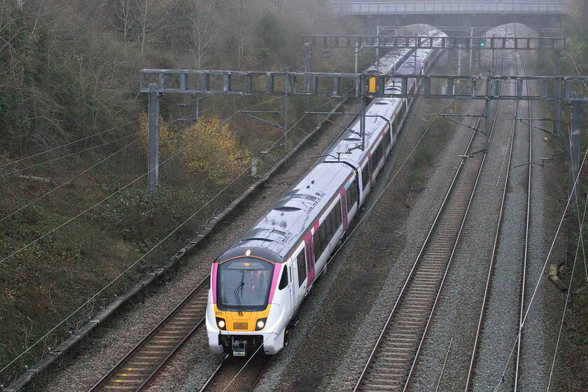 720610 & 720609,12.58 Wembley Yard-Rugby (5Q92, 11E), Hyde Road bridge 
 More testing times! 720610 and 720609 head north through Roade taken from the village's Hyde Road bridge as the 5Q92 12.58 Wembley Yard to Rugby mileage accumulation run. The Derby-built Bombardier Aventras have been in service in East Anglia since 2020 with the latest twelve 7206XX units heading for c2c whose livery can be seen on these units. 
 Keywords: 720610 720609 12.58 Wembley Yard-Rugby 5Q92 Hyde Road bridge