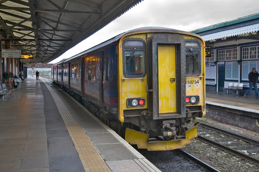 150234, GW 10.25 Warminster-Westbury (2C12), Westbury station 
 Looking a little tatty on the front end with rather chippy hi-viz paintwork 150234 has just arrived with the 2C12 10.25 service from Warminster and terminated. According to the destination blind, it will work forward back whence it has just come and onwards to Southampton. 
 Keywords: 150234 GW 10.25 Warminster-Westbury 2C12 Westbury station