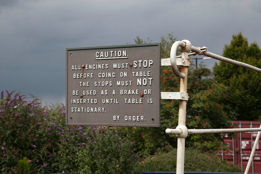 Notice, former turntable, Swindon Works 
 A cast notice attached to the former Swindon Work's turntable. This turntable sits in a car park and acts a reminder to the public of Swindon's industrial heritage, something that should be remembered for generations. 
 Keywords: Notice former turntable Swindon Works