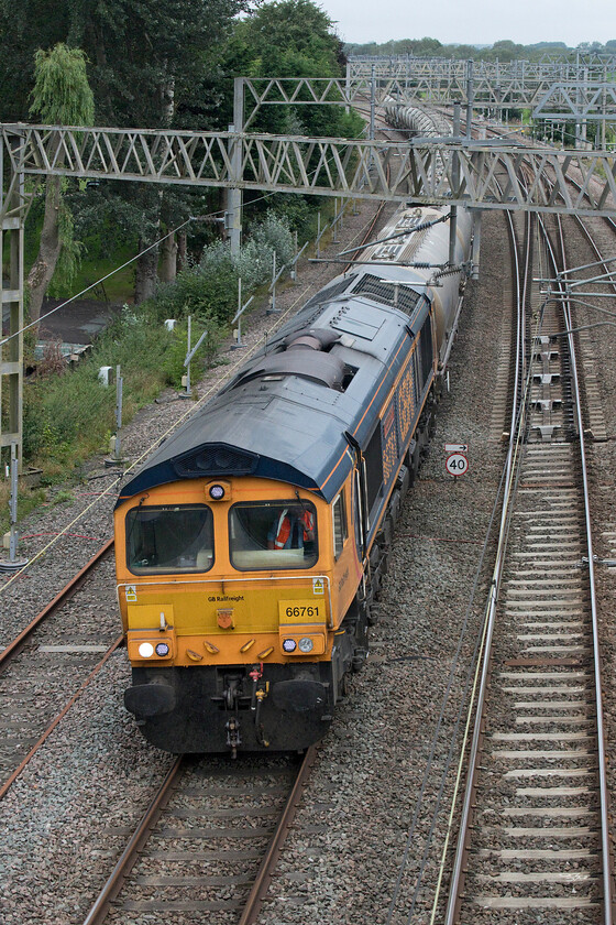 66761, 07.38 Clitheroe Castle Cement-Avonmouth Hanson (6V84,13L), Norton Bridge SJ875290 
 66761 Wensleydale Railway Association 25 Years 1990-2015 passes Norton Bridge leading the 6V84 07.38 Clitheroe to Avonmouth cement train. It was really interesting to be out photographing on a different section of the WCML and see a different variety of freight services such as this one rather than the more mundane Freightliners. 
 Keywords: 66761 07.38 Clitheroe Castle Cement-Avonmouth Hanson 6V84 Norton Bridge SJ875290 GBRf Wensleydale Railway Association 25 Years 1990-2015