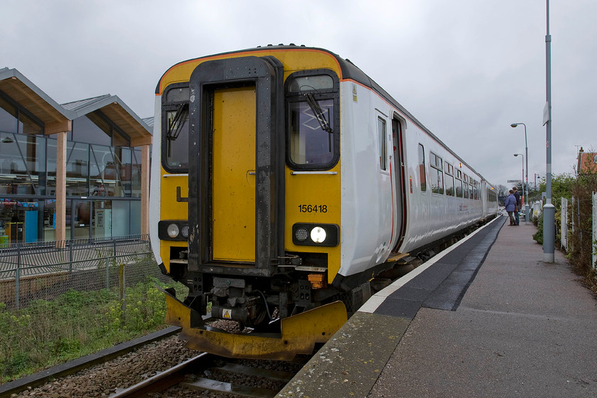 156418, LE 09.46 Sheringham-Norwich, Sheringham station 
 Our train for Norwich waits at the small single platform station at Sheringham. My wife, son and I took the 09.46 service all the way to Norwich worked by GA's 156418. Notice the new Tesco supermarket in the background that opened last year on land once occupied by a poor-quality block of flats. The last time that I saw this unit was ast summer and much closer to home in Roade cutting, see..... https://www.ontheupfast.com/p/21936chg/30063888553/x156418-10-33-wolverton-centre-sidings 
 Keywords: 156418 09.46 Sheringham-Norwich Sheringham station Greater Anglia