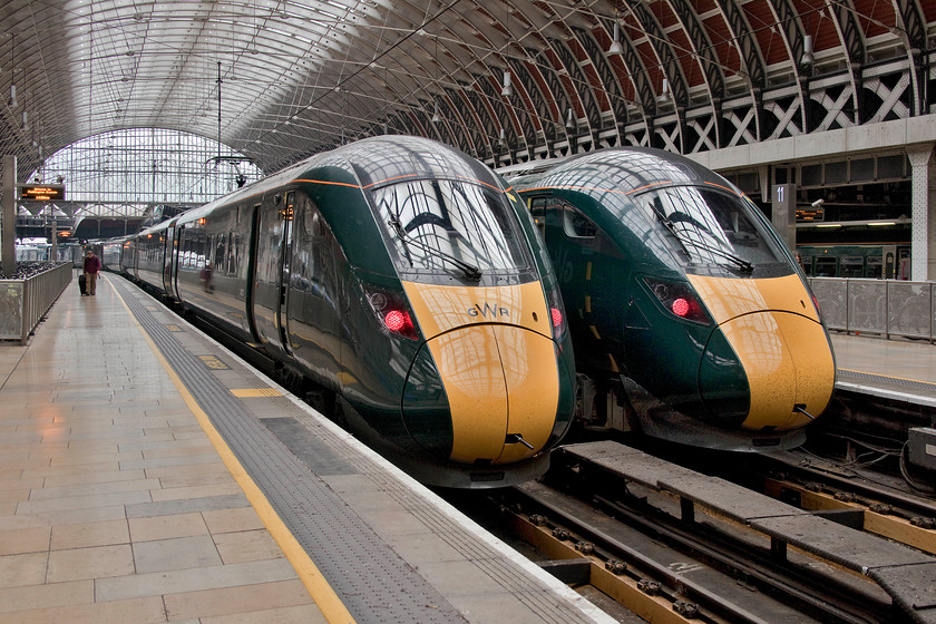 800016, GW 15.22 London Paddington-Worcester Foregate Street (1W31, 27L, cancelled from Worcester Shrub Hill) & class 803, GW 15.15 London Paddington-Cardiff Central (1B48, 5L), London Paddington station 
 The new order at London Paddington station sees 800016 at platform nine that will depart with the 15.22 to Worcester Foregate Street, Unfortunately, something went wrong on its journey as it arrived nearly thirty minutes late at Worcester Shrub Hill and was terminated. Next to it, an unidentified 800/3, one of the nine-car sets, waits to leave with the 15.15 1B48 service to Cardiff central. I hope that passengers aboard had brought their feather cushions to make the journey more comfortable on the infamously hard seats installed in these trains! 
 Keywords: 800016 15.22 London Paddington-Worcester Foregate Street 1W31 class 803 15.15 London Paddington-Cardiff Central 1B48 London Paddington station