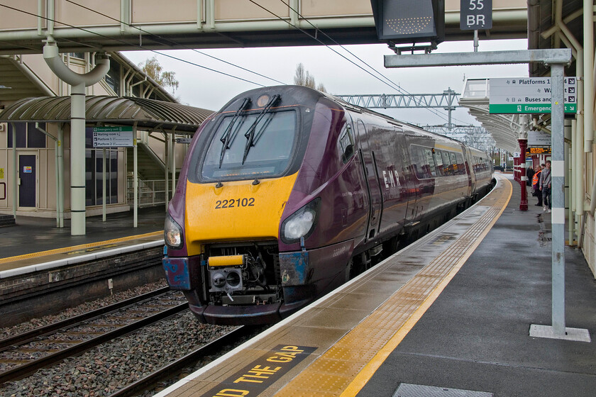 222102, EM 13.12 Nottingham-London St. Pancras (1B52, 4L), Kettering station 
 Having travelled up from Leicester on the 13.12 Nottingham to St. Pancras EMR service Andy has alighted at Kettering and I have turned my camera to 222102 prior to its departure. We have had to change here at Kettering as there are no fast Meridian services now serving Wellingborough and all stations south from here that is something that EMR has rightfully received a lot of criticism over. Passengers have to change here and take a stopper local service operated by EMRs fleet of hand-me-down Class 360 Desiros. 
 Keywords: 222102 13.12 Nottingham-London St. Pancras 1B52 Kettering station EMR EMT Meridian