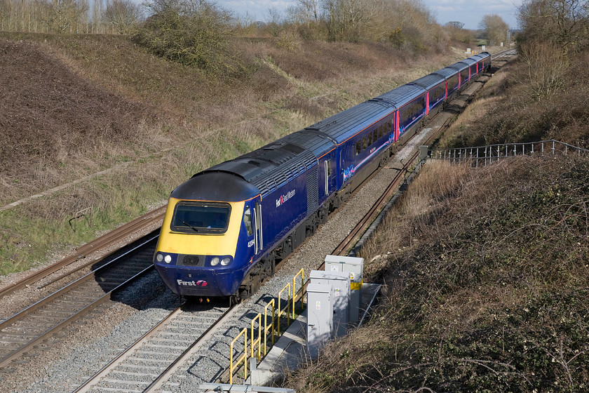 43094, GW 13.36 London Paddington-Cheltenham (1G48), Baulking 
 43094 sweeps around a gentle curve on the GWML at Baulking leading the 13.36 Paddington to Cheltenham 1G48 service. It is superb open spots such as this that characterises the GWML that will be completely ruined for the photographer once the electrification masts arrive in the coming months. Baulking is s small west Oxfordshire village a few miles south of Farringdon. 
 Keywords: 43094 13.36 London Paddington-Cheltenham 1G48 Baulking