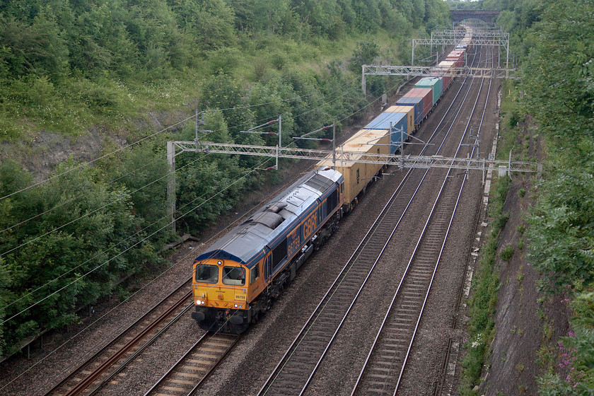 66759, 11.55 London Gateway-Hams Hall (4M46), Roade Cutting 
 GBRF liveried 66759 'Chippy' hauls the 11.55 London Gateway to Hams Hall Freightliner. The 4M46 working is seen passing through Roade Cutting. The unusual name'Chippy' is in the memory of a former GBRF train manager, Clive Chippington, who unexpectedly passed away in 2015. 
 Keywords: 66759 11.55 London Gateway-Hams Hall Freightliner 4M46 Roade Cutting