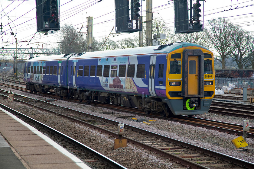 158901, NT 12.36 Hazel Grove-Preston (2N26, 3L), Preston station 
 By the time I had got to Preston the lovely weather of earlier had all but gone. It had clouded up and the light became very 'flat'. 158901 arrives into Preston working the 12.36 from Hazel Grove. 
 Keywords: 158901 2N26 Preston station