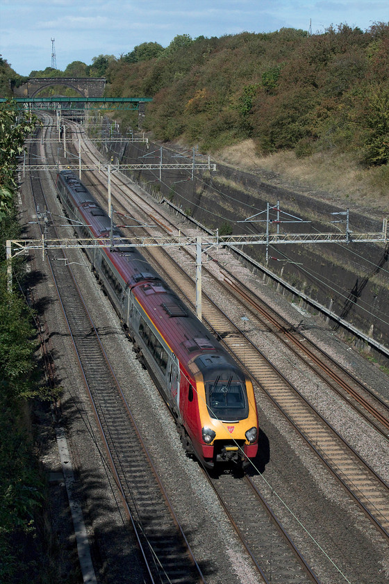 Class 221, VT 11.28 Chester-London Euston (1A19, 5E), Roade Cutting 
 An unidentified class 221 works the 11.28 Chester to London Euston 1A19 service through the glorious Roade Cutting. 
 Keywords: Class 221 1A19 Roade Cutting