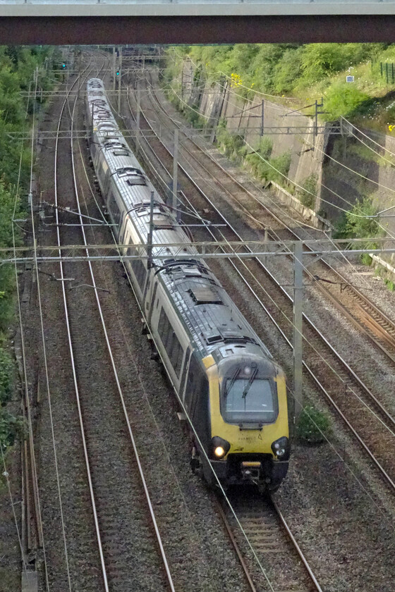 221101 & 221106, VT 14.48 Holyhead-London Euston (1A62, 2L), Roade cutting 
 A poor picture (quality-wise) of a pair of Voyagers passing through Roade cutting but every one that I take today could well be the last on this route as the rollout of the Class 805s continues apace. 221101 and 221106 pass through Roade cutting working the 14.48 Holyhead to Euston service. 
 Keywords: 221101 221106 14.48 Holyhead-London Euston 1A62 Roade cutting AWC Voyager