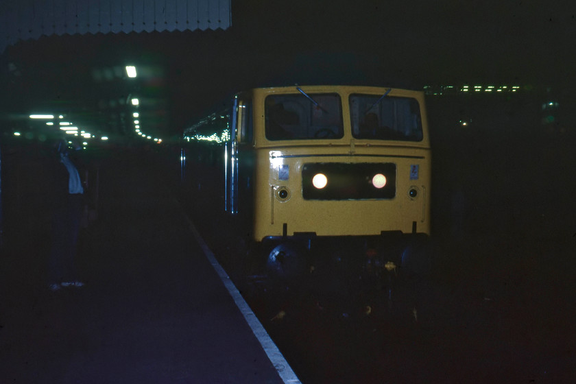 47197, 21.30 Bristol Temple Meads-Plymouth, Bristol Temple Meads station 
 Quite why I took this picture of a 'Duff' in the dark at Temple Meads on a very mundane working I am not sure? 47197 looks smart and shiny at the head of the 21.30 Bristol to Plymouth. 47197 led a pretty ordinary life surviving through carrying the same number until withdrawal came in October 2005, with cutting up in January 2008. 
 Keywords: 47197 21.30 Bristol Temple Meads-Plymouth Bristol Temple Meads station