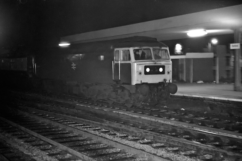 47456, unidentified down working, Oxford station 
 Quite why I decided to take this picture I do not understand! However, I have included it for interest sake. 47456 enters Oxford station with an unidentified down working. This was the final number worn by this locomotive as it did not last very long in service bing withdrawn in 1991. 
 Keywords: 47456 down working Oxford station