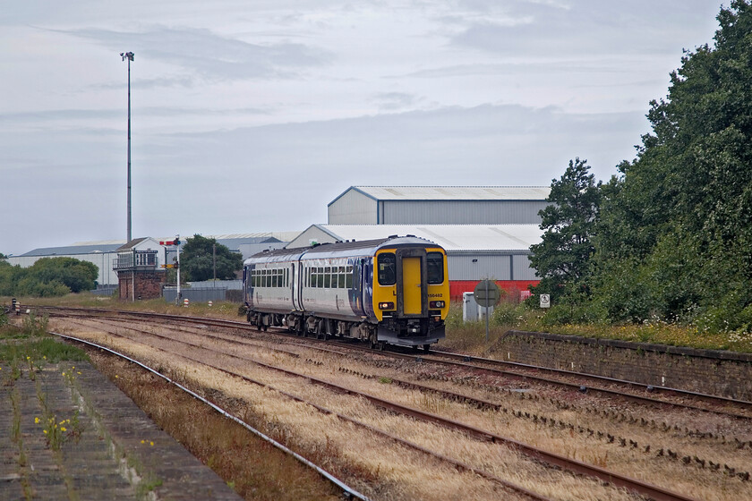 156482, NT 09.28 Barrow-in-Furness-Carlisle (2C45, 6L), Workington station 
 The railways around Workington are a shadow of what they once were. With the closure of the steelworks in 2006 the curtain was brought down on another UK-based industry leaving us vulnerable to foreign imports. The scene to the south of Workington station epitomises the situation with overgrown sidings, removed track and rusty railheads. 156482 drifts into the station working the 09.28 Barrow-in-Furness to Carlisle service. The platform was surprisingly busy with the train well loaded, indicating that the railways are doing well in this area. 
 Keywords: 156482 09.28 Barrow-in-Furness-Carlisle 2C45 Workington station