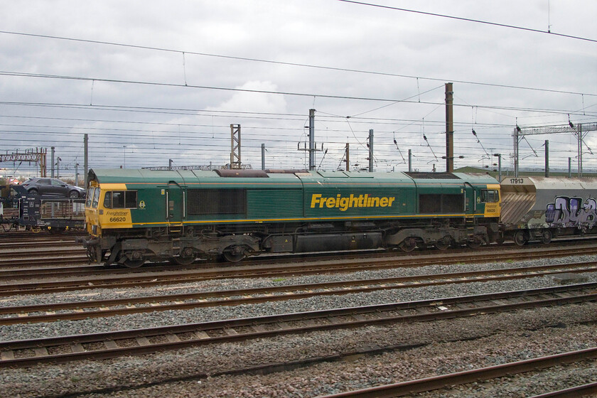 66620, 09.23 Ardingly-Wembley (6M57), Wembley Yard 
 A broadside photograph of 66620 as it stands in Wembley Yard having recently arrived leading the 6M57 09.23 from Ardingly. Ardingly is an aggregates depot deep in the Sussex countryside on the short spur that once linked the Brighton mainline to what is now the Bluebell line 
 Keywords: 66620 09.23 Ardingly-Wembley 6M57 Wembley Yard Freightliner