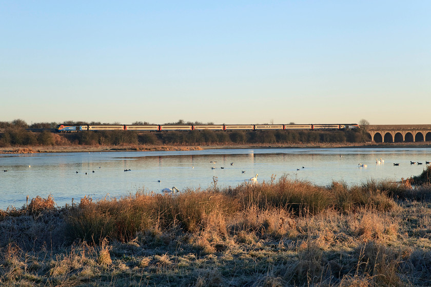 43060 & 43045, EM 08.15 London St.Pancras-Nottingham (1D12, 5L), Nene Valley SP913670 
 Just after sunrise on a cold and frosty December morning, 43060 and 43045 cross the Nene Valley just south of Wellingborough forming the 08.15 St. Pancras to Nottingham train. This is a lovely spot that I have used not often enough but also one that will be significantly compromised when the catenary arrives sometime during 2018. This picture was published in Rail magazine. 
 Keywords: 43060 43045 08.15 London St.Pancras-Nottingham 1D12, 5L Nene Valley SP913670