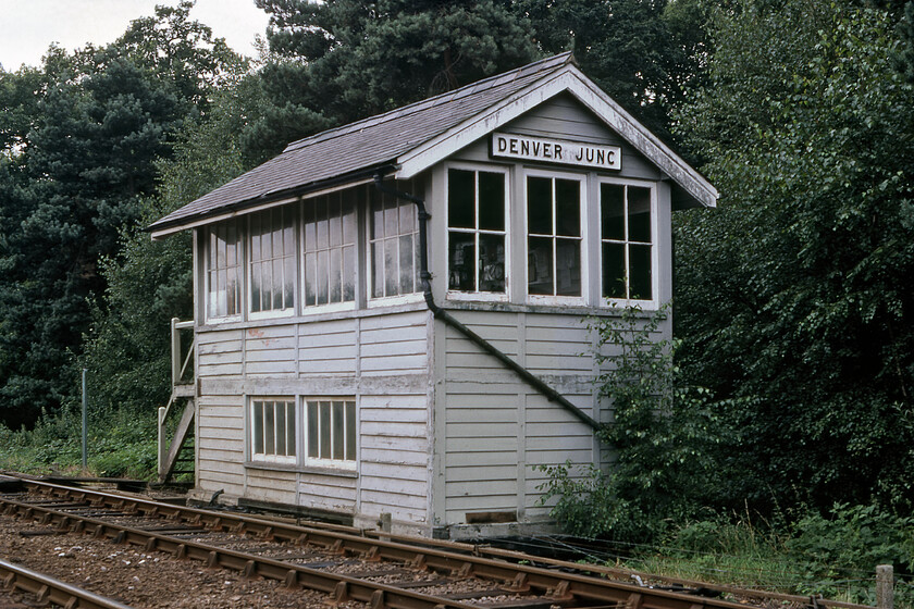 Denver Junction signal box (GE, date not known) 
 DenverJunction signal box rarely saw use in its later years spending most of its time switched out being located only a couple of miles south of Downham Market. It stood at the point where the branch to Stoke Ferry branched east from the King's Lyn line. It was manned when rail access was required as far as the sugar beet loading depot at Abbey that itself was rail-connected to the Wissington beet factory via a light railway that was once part of a much wider network. With the transportation of sugar beet being transferred to road in 1982 Denver Junction was no longer required so it was closed. It was a Great Eastern box with an unknown date of construction unless anybody can advise me. 
 Keywords: Denver Junction signal box Great eastern