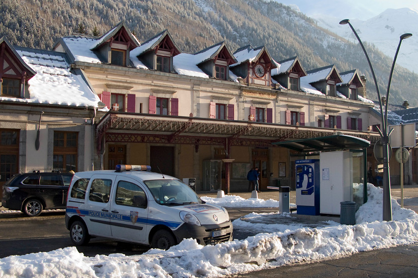 Frontage, Chamonix Mnt Blanc station 
 The elegant frontage of Chamonix Mnt. Blancs SNCF station is seen in the late afternoon sunshine. It is operated by SNCF but only part of the grand building is now in use by the railway. Notice the Swiss flag above the canopy, testament to the fact that the line that passes through the station links Switzerland to France. 
 Keywords: FrontageChamonix Mnt Blanc station