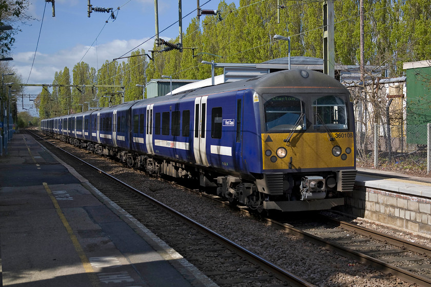 360108, unidentified London Liverpool Street-Clacton working, Weeley station 
 An unidentified Liverpool Street to Clacton service pauses at Weeley station being worked by 360108. If the name Weeley seems vaguely familiar it may because it hosted a huge rock festival in 1971that was graced by such bands as Status Quo, T Rex, Mungo Jerry and King Crimson. It is estimated that this one-off festival, in the year when the Isle of Wight one was cancelled, that over one hundred thousand attended with many no doubt using the diminutive railway station. 
 Keywords: 360108 London Liverpool Street-Clacton Weeley station Greater Anglia Desiro