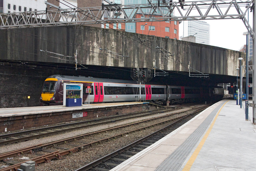 170398, XC 11.10 Nottingham-Cardiff Central (1V08, 7L), Birmingham New Street station 
 170398 leaves New Street with the 11.10 Nottingham to Cardiff Central. Despite Birmingham New Street having had an extensive re-build there is still vast amounts of its previous re-construction in the 1960s in evidence. This bridge parapet has not weathered particularly well but I suppose that's characteristic of most of the brutalist style! 
 Keywords: 170398 1V08 Birmingham New Street station