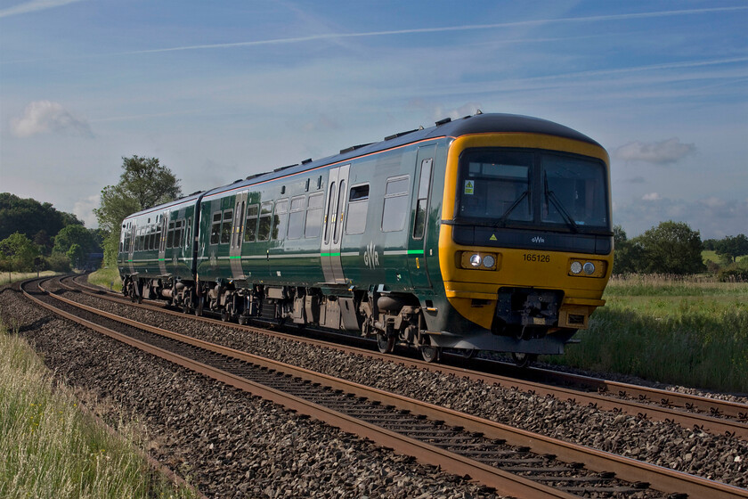 165126, GW 08.06 Didcot Parkway-Banbury (2M10, 2L), King's Sutton SP491367 
 From Penzance, to west Wales, to Worcester, to Paddington and here in Northamptonshire the GWR franchise covers the largest and most diverse geographical area of all TOCs. 165126 has just left King's Sutton working the 2M10 08.06 Didcot to Banbury service. The photograph is taken from a foot crossing that permits access to the meadows through which the River Cherwell flows. 
 Keywords: 165126 GW 08.06 Didcot Parkway-Banbury 2M10 King's Sutton SP491367 GWR Great Western Railway