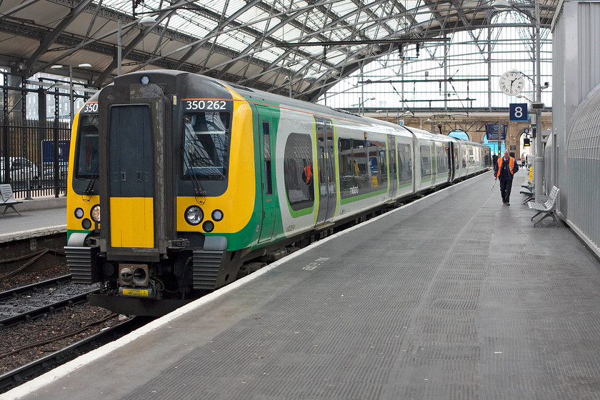 350262, LM 13.34 Liverpool Lime Street-Birmingham New Street (1L99), Liverpool Lime Street station 
 350262 waits at platform eight of Liverpool Lime Street station. In three minutes time the dispatcher, who is seen walking up the platform, will wave it off working the 13.34 to Birmingham New Street. 
 Keywords: 350262 13.34 Liverpool Lime Street-Birmingham New Street 1L99 Liverpool Lime Street station