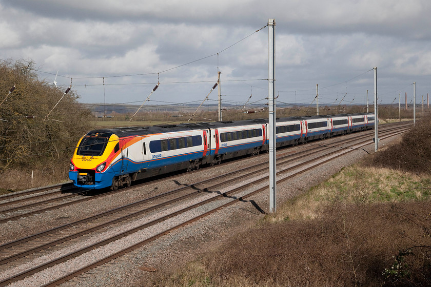 222004, EM 08.29 Sheffield-London St. Pancras (1C25, 7L), Millbrook TL020397 
 Seven-car Meridian 222004 passes Millbrook just south of Bedford working the 08.29 Sheffield to London St. Pancras 1C25 service. There is no doubt that these DMUs have been a great success on the Midland Mainline but I have to question their suitability for long journeys. Depending on where you sit there you may experience a nagging level of vibration due to the under-body Cummins QSK19 engines intruding. Also, their ride quality is not great on some sections of the Midland. 
 Keywords: 222004 1C25 Millbrook TL020397