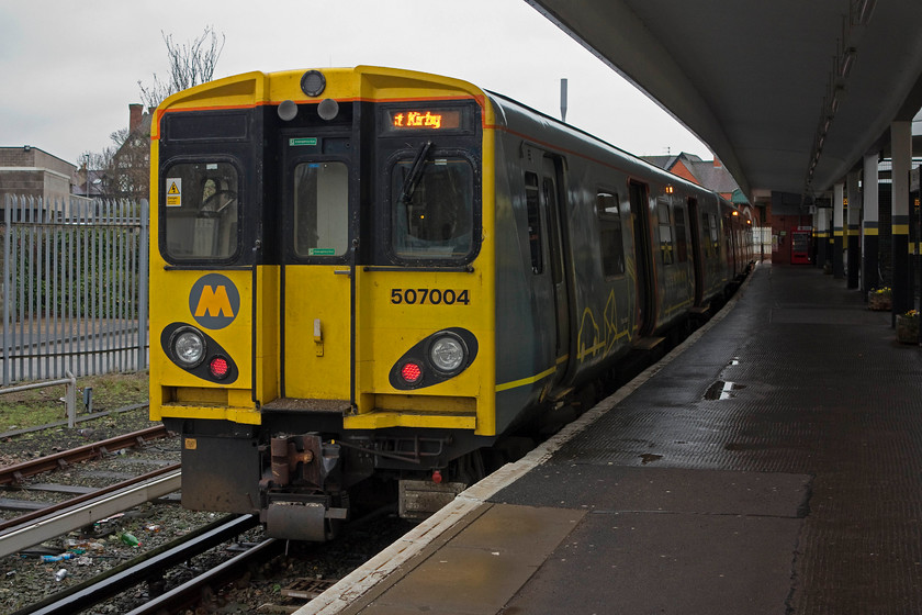 507004, ME 12.21 West Kirby-West Kirby (2W24, RT), West Kirby station 
 We picked this train up at Liverpool central and took it to West Kirby. Basically, they spend the day doing this out and back route of the Wirral Line. 
 Keywords: 507004 2W24 West Kirby station