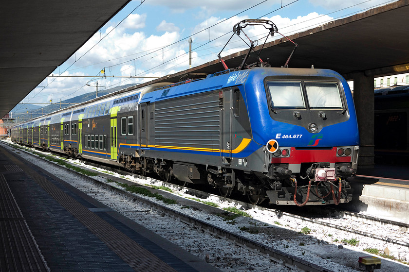 464.777, 14.38 Florence SMN-Pistoia (3066), Florence SMN station 
 464.777 waits at the rear of the 14.38 Florence SNN to Pistoria 3066 working. This is one of the modified class 464s for use with the new Vivalto two floor coaches. 
 Keywords: 464.777 14.38 Florence SMN-Pistoia 3066 Florence SMN station