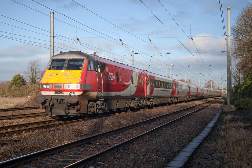 82213 & 91129, GR 10.04 York-London King`s Cross (1Y82, 2L), Gill`s Crossing 
 In lovely winter light, DVT 82213 leads the 10.04 York to King's Cross past Offord Cluny between Huntingdon and St. Neots. The photograph is taken from a popular local footpath called Gill's crossing that leads from the village down to the Great Ouse that, on this day, was flooding following some very heavy rain. 
 Keywords: 82213 91129 10.04 York-London King`s Cross 1Y82 Gill`s Crossing Offord Cluny LNER