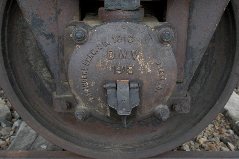 Axle box, former German Railway`s wagon, Auschwitz II-Birkenau 
 An axle box cover from a four-wheel wagon sitting on a section of track inside the former Auschwitz II-Birkenau camp. 
 Keywords: Axle box, former German Railway`s wagon, Auschwitz II-Birkenau