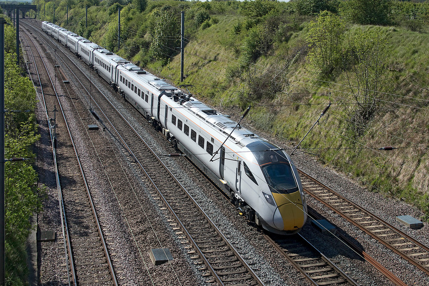 801201, 09.41 Peterborough-Doncaster (5Q61), Essendine TF043129 
 The future is here and on-test at Essendine! 800201 is presently un-branded and operating a test run as the 09.41 Peterborough to Doncaster. This day marked the press launch of the class 800 Azumas with a return King's Cross to Leeds service carrying invited guests and dignitaries to experience the new train. Unlike the majority of other services that were operating late due to issues in the Stevenage area, this 'special' arrived on-time; strange! 
 Keywords: 801201 09.41 Peterborough-Doncaster 5Q61 Essendine TF043129