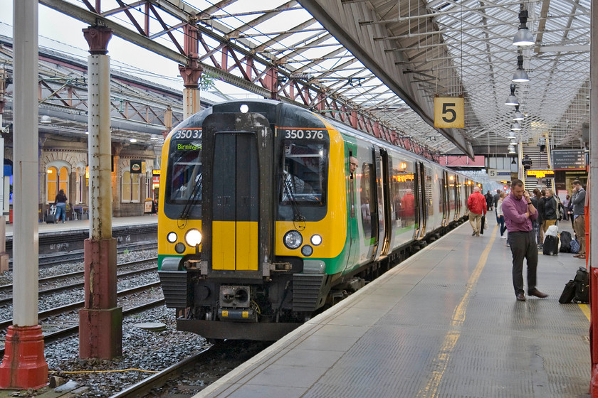 350376, LM-19.34 Liverpool Lime Street-Birmingham New Street (1L93), Crewe station 
 London Midland's 350376 stands at Crewe station with the 1L93 19.34 Liverpool Lime Street to Birmingham New Street service. After a few days away in the north of Scotland enjoying strange and exotic trains and operators, a familiar Class 350 is like coming home; shame that we are still at Crewe! 
 Keywords: 350376 19.34 Liverpool Lime Street-Birmingham New Street 1L93 Crewe station London Midland Desiro