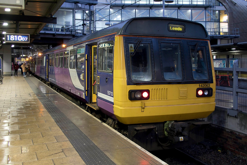 142063 & 142030, 18.23 Leeds-Wigan North Western (1J27, 1E), Leeds station 
 Double Pacer action at Leeds station! 142063 and 142030 are getting ready with the 18.23 to Wigan North Western. On Real Time Trains, this service was not scheduled to be a Pacer but a 150/153/155/156 (Sprinter) DMU. These units would only be marginally better than a Pacer I suppose! 
 Keywords: 142063 142030 18.23 Leeds-Wigan North Western 1J27 Leeds station